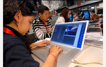 Photo of children using the Internet for a school project.