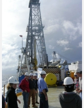 Scientists drill into ocean crust from aboard the vessel JOIDES Resolution