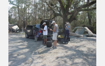 Mike Lotre, John Dugan and Robin Murphy monitor the UAVs during their deployment.