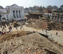people and destroyed building in Durbar Square in Kathmandu, after the earthquake.