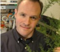 Jay Keasling poses with artemisia. The plant's genes are useful for creating antimalaria drugs.