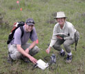 Photo of Ed Ayres and Diana Wall measuring indicators of soil biological activity in Kenya.