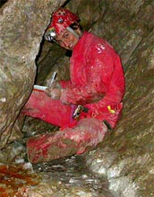 Photo of Jennifer Macalady collecting microbial samples in the Frasassi cave system.