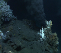 image showing dust and rock formations in the ocean