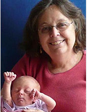 Photo of Hansma with her grandchild.