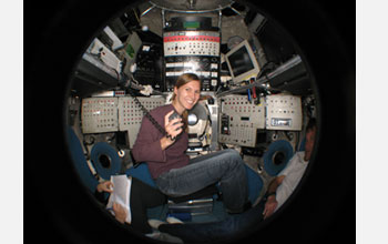 Photo of Anne Dekas collecting methane-seep sediments from the deep-sea submersible Alvin.