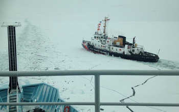 Coast Guard Cutter Mobile Bay alongside R/V Sikuliaq.