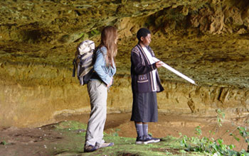 Nancy Stevens with Tanzanian geologist Evelyn Mbede survey the field