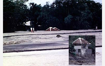 Photo of a house buried by a mudflow of volcanic ash and debris after Pinatubo's eruption.