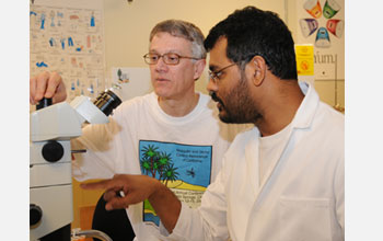 Photo of Walter Leal, professor of entomology, and Zain Syed, postdoctoral researcher.