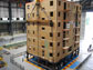 Photo of a six-story condominium building being transported for a full-scale earthquake test.