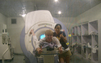 Photo of Sook-Lei Liew and R.J. Andrews in the MR scanner room at Peking University First Hospital.