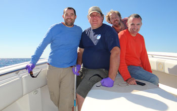 Photo of scientists on a boat: Valentine; Nelson; Kellermann, Reddy.