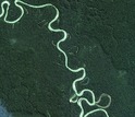 A false-color satellite image shows a western Amazonian river course