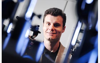 Photo of Vadim Backman with some of the equipment he uses to detect cancer.