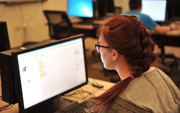 woman in front of a computer