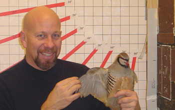 Ken Dial with an adult chukar partridge