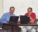 Atlas of Lie Groups Project members Fokko du Cloux (left) and Jeffrey Adams discuss E8.