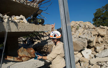 Photo of researcher Robin Murphy studying robot-human interactions during a disaster scenario.