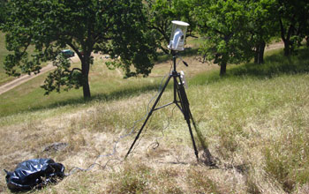 A wireless video camera records in the field