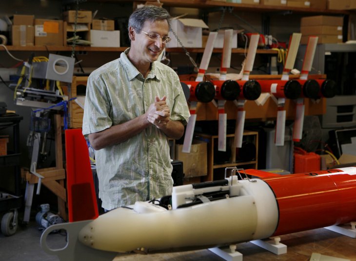 Oceanographer Dan Rudnick checks on a Spray glider before it sets forth on a mission.