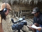 A researcher records language variation on the Indonesian island of Sumba.