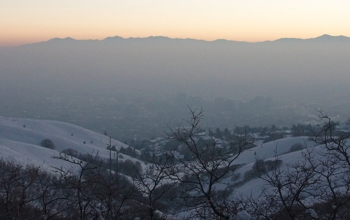 snowy landscape with SLC in the distance