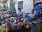 Photo of vendors selling their goods at an open air market in the Philippines.