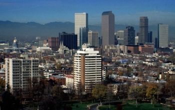 Trapped by an inversion, a thick blanket of pollution, or brown cloud, hangs over Denver