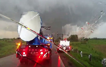 Doppler on Wheels seen through windshield with tornado nearby