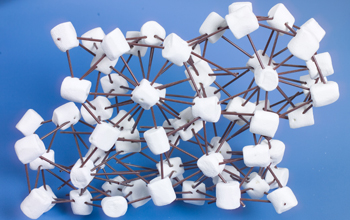 Photo showing marshmallows representing hairy spheres connected with plastic coffee stirrers.