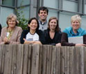 group of teachers posing outside a building