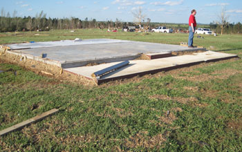 damage from a tornado in Alabama on April 27, 2011.