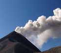 A small explosion from Fuego, an open-vent volcano located 20 miles west of Guatemala City.