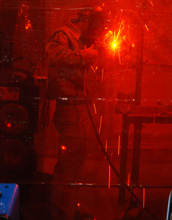 A person welding.