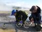 researchers testing the hot springs