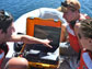 students in a boat use acoustic imaging