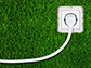 an outlet in the grass