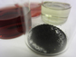 hybrid nanoparticles (dark red)