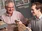 researchers look over a sample from Antarctica