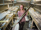 Elizabeth Thomas holds half of a sediment core