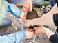 geologists collecting river sand in a sieve