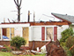 a house with it's roof blown off