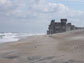 photo of rising seas lapping at a house