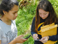 two volunteers collect samples in the East Bay