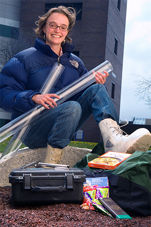 Grad student Elizabeth Thomas shows gear she'll take on NSF-funded Arctic expedition