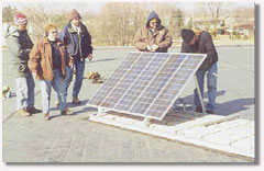 researchers install an experimental solar panel