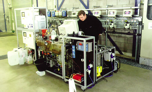 Alex Cornelissen samples on-site with the pilot scale flocculation plant.
