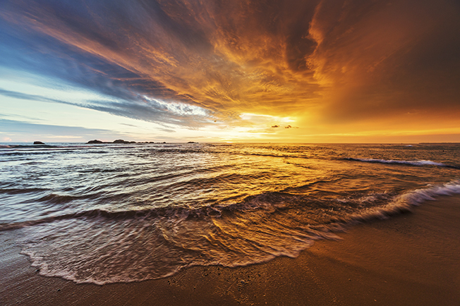 [Sunset over the Indian Ocean; Credit: iStock]