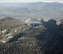 An empty lagoon, where a glacial dam burst during the eruption, is at the glacier's lower end.